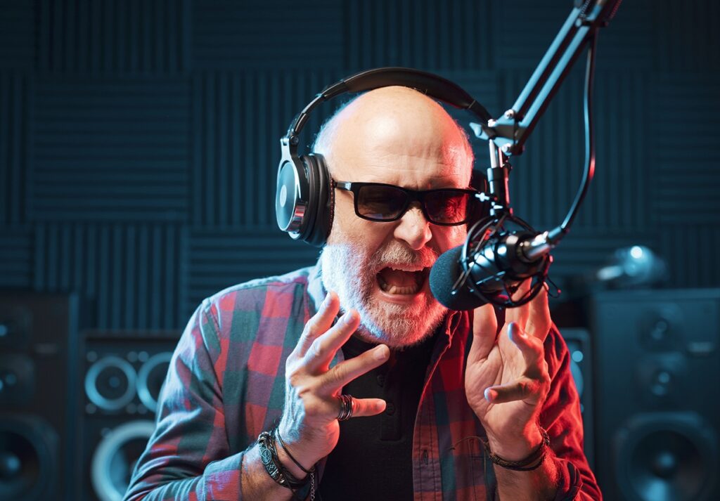 Aggressive DJ talking into the microphone
