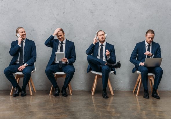 collage of cloned young businessman sitting on chairs and using gadgets