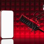 3D rendering of podcast microphone and smartphone with blank screen in red acoustic studio background, concept of broadcasting and recording setup. 3D Rendering